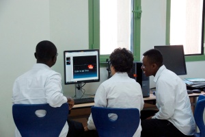 Students at Makkah College working at a computer